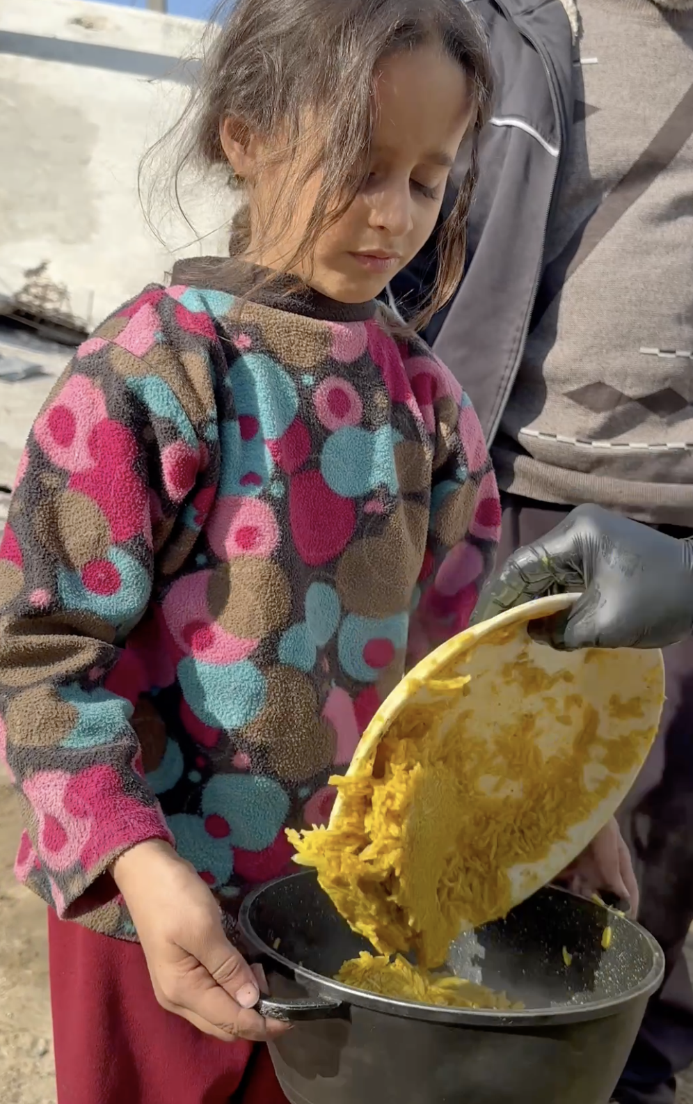 Children Lining Up for a Hot Meal in Gaza