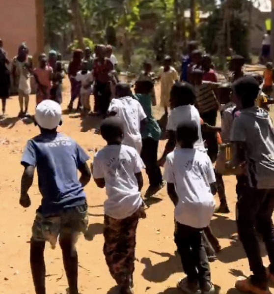 Joyful Moments: Ada Nur Orphans Dancing and Playing in Uganda