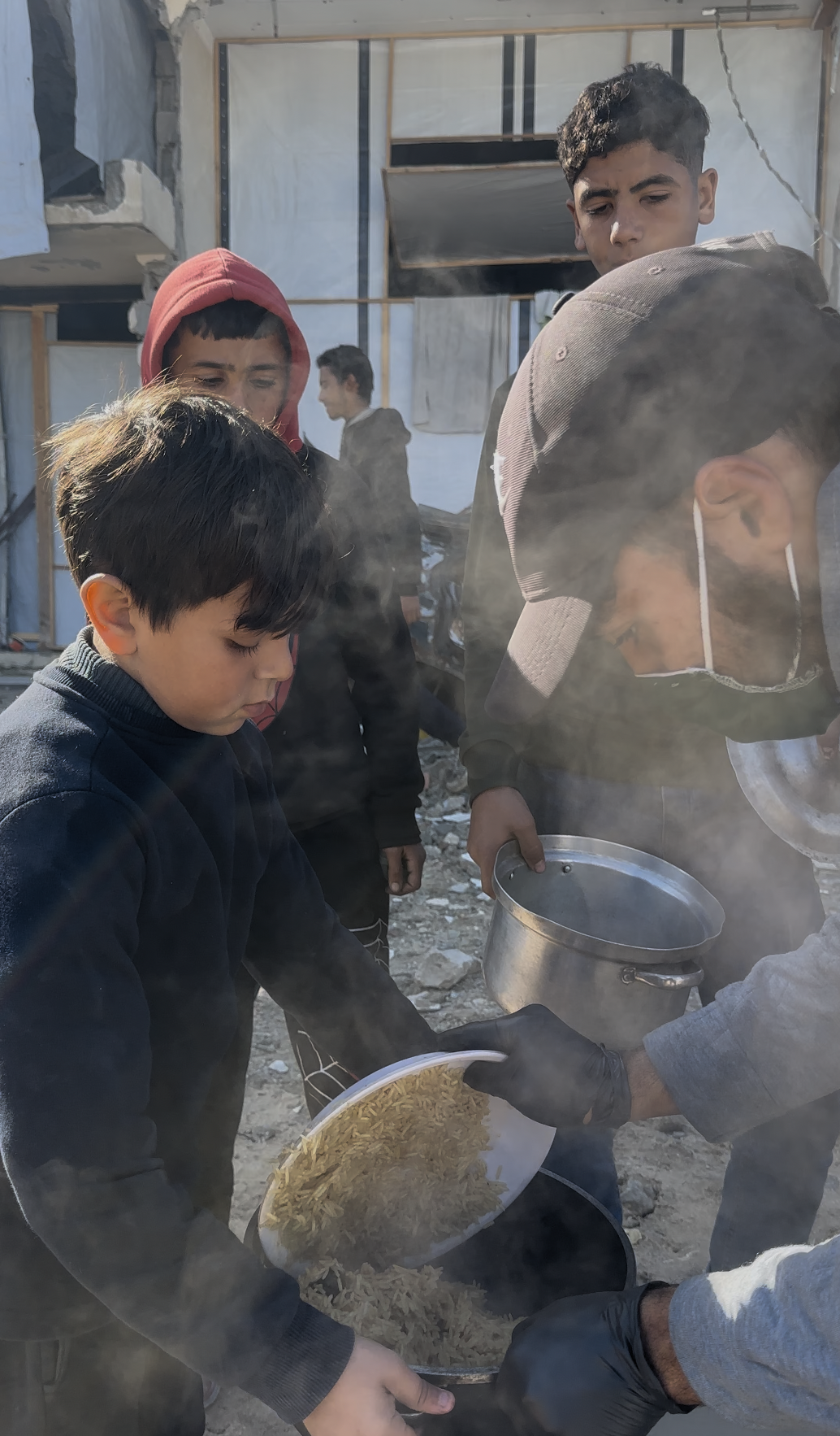 Food Aid Distributed to Families in Gaza as Hunger Deepens